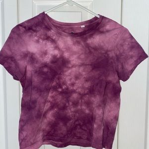 Purple and white tie dyed t shirt.